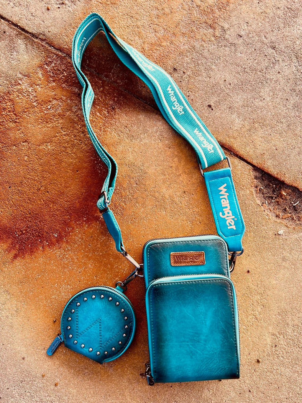 turquoise, leather, sling bag, crossbody. Small Business. Get Gussied Up. Woman Owned Boutique. 