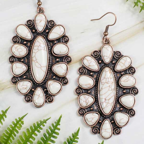 A unique statement-maker, these elegant Western Scroll & Stone Earrings are a must-have for any fashionista's jewelry box. Crafted with a sophisticated fish hook back, a detailed scroll design, and a multi stone pendant style, these earrings come in four colors - Turquoise & Copper, Turquoise & Silver, Copper & White, and Copper & Turquoise - to perfectly elevate any ensemble.
