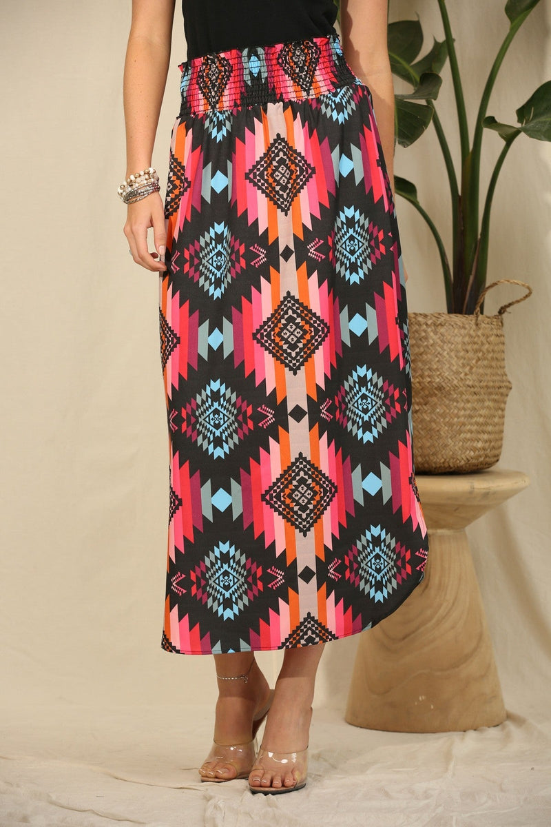 Brightly colored Aztec print skirt. Long colorful Aztec print skirt. Elastic waist band skirt. Women's western wear. Western boutique. Online boutique. Small business. Woman owned. Western fashion trends. Women's western apparel. 