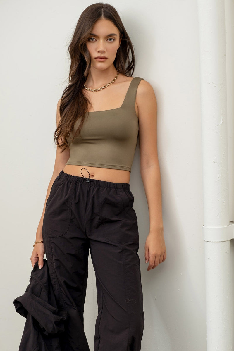 Solid cropped tank. Soft tank top. Trendy clothes. Trending outfits. Style. Boutique. Small business. Woman owned.