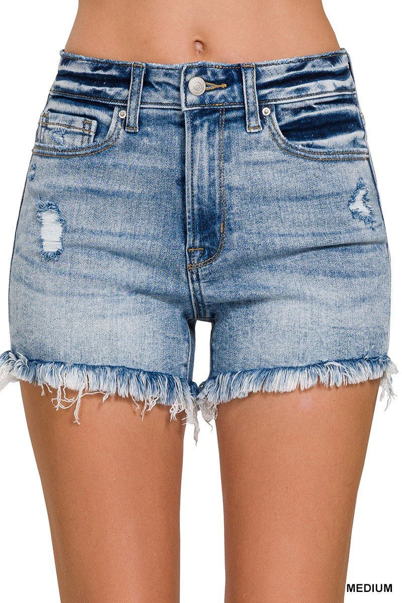 Denim shorts. Jean shorts. Denim shorts with frayed hem. Frayed hem shorts. Medium wash shorts. High rise shorts. Trendy jean shorts. Trending denim shorts. Distressed denim shorts. Distressed jean shorts. Blue jean shorts. Summer outfits. Women's style. Women's boutique. Women's outfits. Small business. Woman owned.