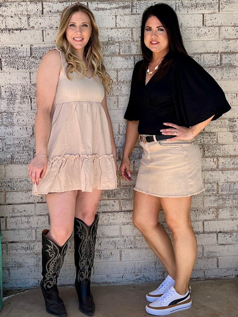 Casual everyday wear dress. Khaki dress. Solid color dress. Simple dress. Midi-dress. Spring dress. Dress with ruffles. Tan dress. Fashion trends. Women's fashion. Women's Style. Simple dress. Daily wear dress. Comfortable style. Boutique. Online women's boutique. Small business. Woman owned. Fast shipping from Texas.