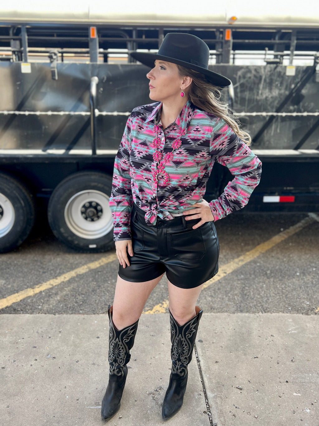 Women's western wear. Women's western button up. Women's western pearl snap. Western style. Turquoise button up. Aztec button up. Western long sleeve button up top. Women's rodeo wear. Rodeo style. Western outfit. Women's western boutique. Boutique. Online boutique. Small business. Woman owned.