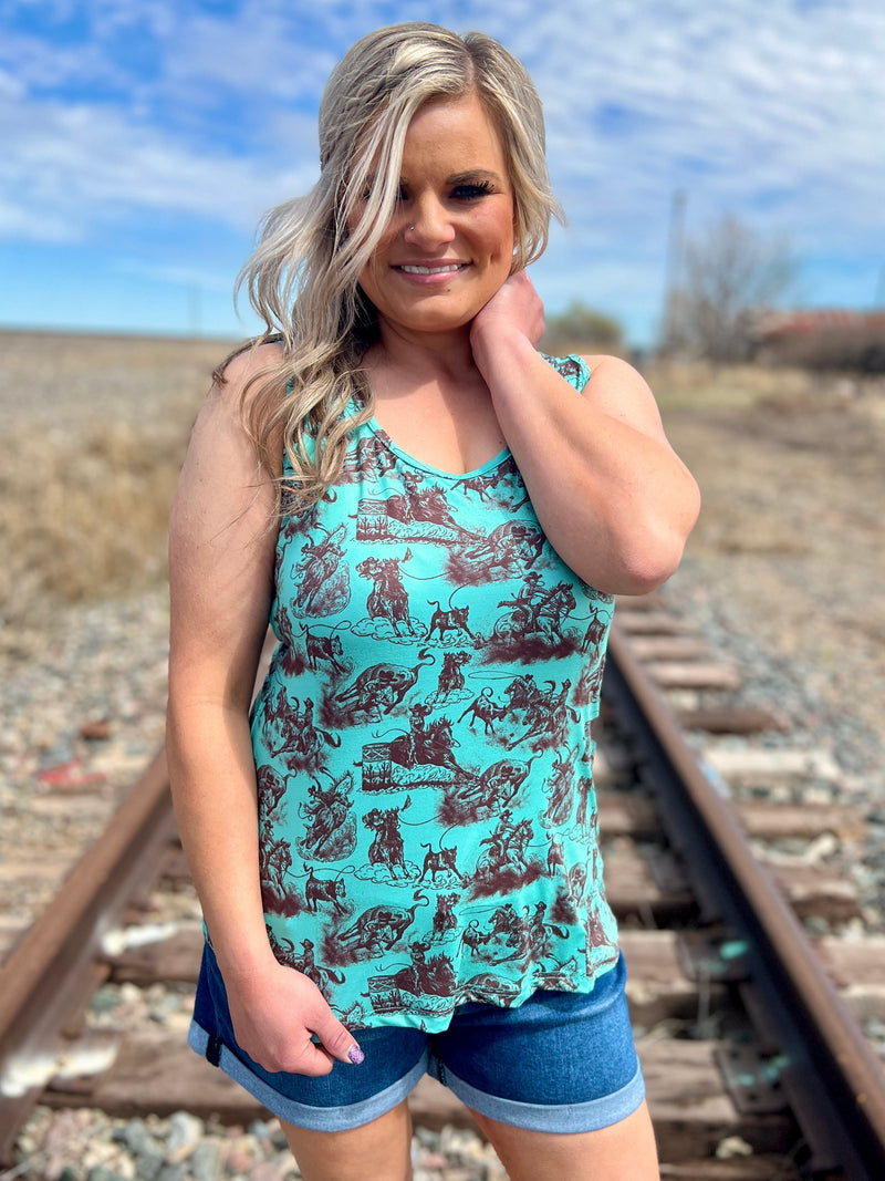 Western print turquoise tank top. Vintage western print racer tank. Turquoise tank top. Women's western wear. Women's trending fashion. Women's western boutique. Online boutique. Small business. 