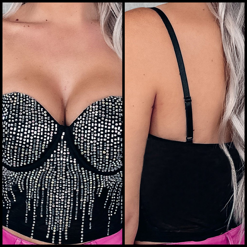 This Shimmering Body Crop Top is the ultimate statement piece for your next night out. Crafted from a luxurious black fabric and encrusted with shimmering rhinestones, this bustier crop top is the perfect combination of opulence and edgy style. Offering adjustable straps for ultimate comfort, you can show off your trend-setting attitude and stand out from the crowd.  95%Polyester+5%Spandex