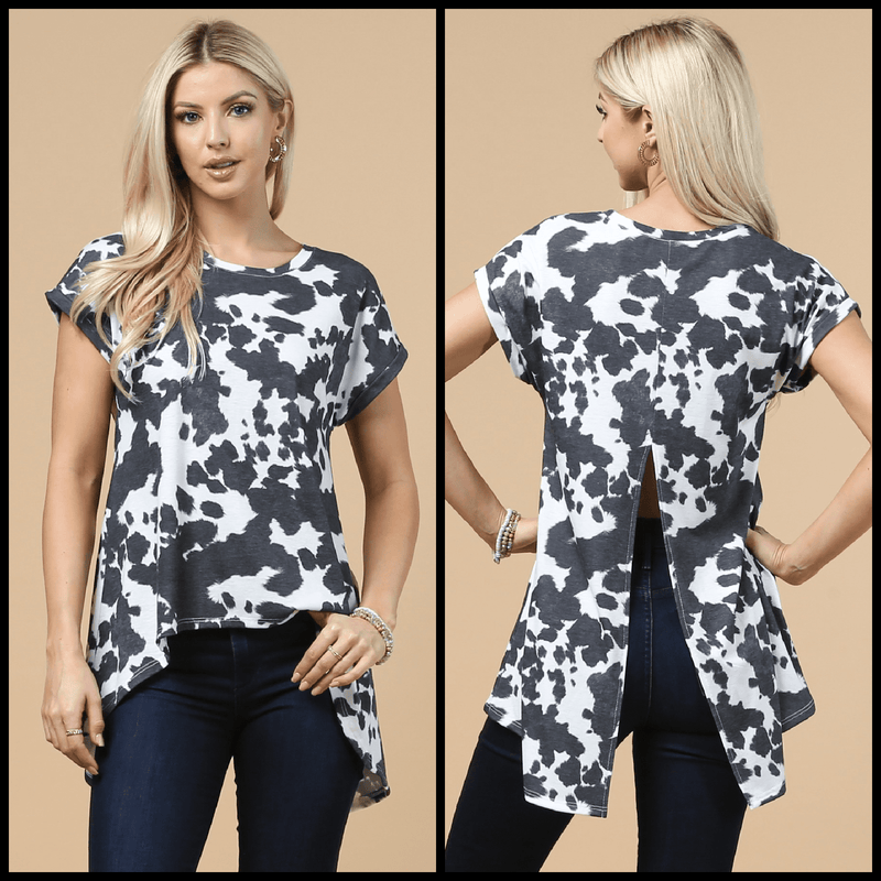 Look your mooo-tivational best in this Zoey Flowy Open Back Top! Made from a black and white cow-print fabric, this casual-wear top features a crew neck, cuffed short sleeve, a high-low cut, and open back. So why moo-d around? Show off your style with this one-of-a-kind top!  78% Polyester, 18% Rayon, 4% Spandex