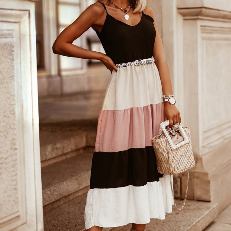 This maxi dress is colorful yet sophisticated. Its color block design of black, white, pink, and off white gives a timeless aesthetic. The spaghetti straps, v neck, and flowy fit make for a look that is both chic and comfortable.  100% Viscose