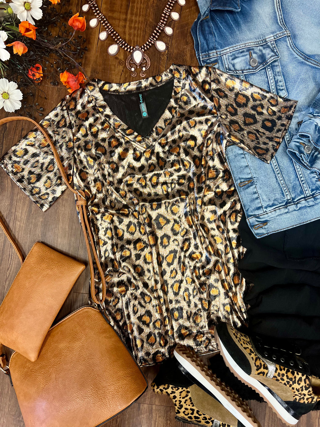 Gold metallic leopard print top. Metallic leopard v-neck shirt. Leopard print v-neck. Metallic cheetah print top. Women's western wear. Women's western boutique. Women's trending fashion. Online boutique. Small business. 