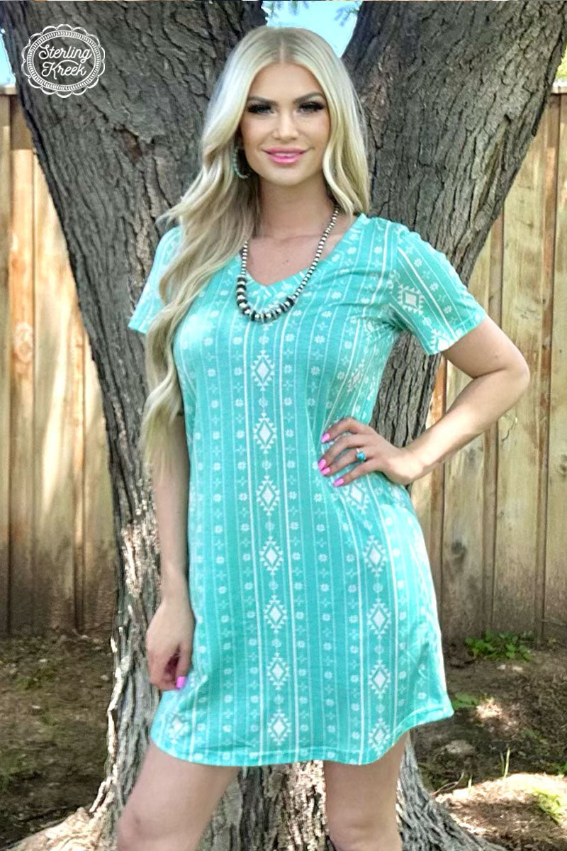 Make a statement with this unique PLUS Walking In Turquoise Dress! Show off your trend-setting style with its vibrant turquoise hue and eye-catching white aztec print. Turn heads wherever you go - you'll be the life of the party!  94% polyester 6% spandex 