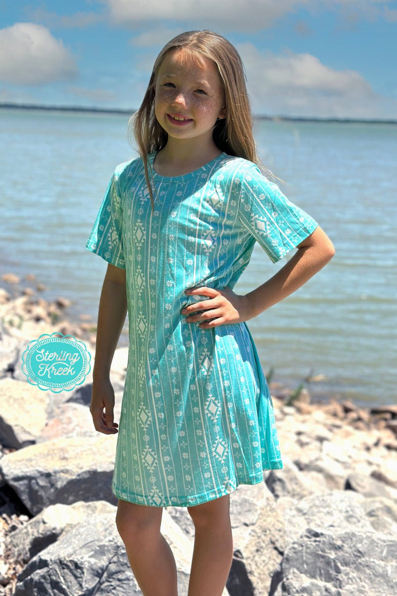 Make a statement in this one-of-a-kind turquoise dress! It has a white aztec print, perfect for strutting on the street or twirling on the dance floor. An eye-catching combo that's sure to turn heads! Rock this mini and walk it out!  26% cotton, 69% polyester, 5% spandex  