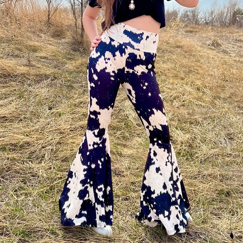 These pants are so fun! They are a yoga pants material and are so comfy and soft! These also have high waisted cloth waistband, and the cutest bell flare you've ever seen!  Model is wearing an XS  92% POLYESTER 8% SPANDEX  **These Bells are longer length for our taller girls. They are the same fit in the waist & hips. Just a few inches longer in length!!   