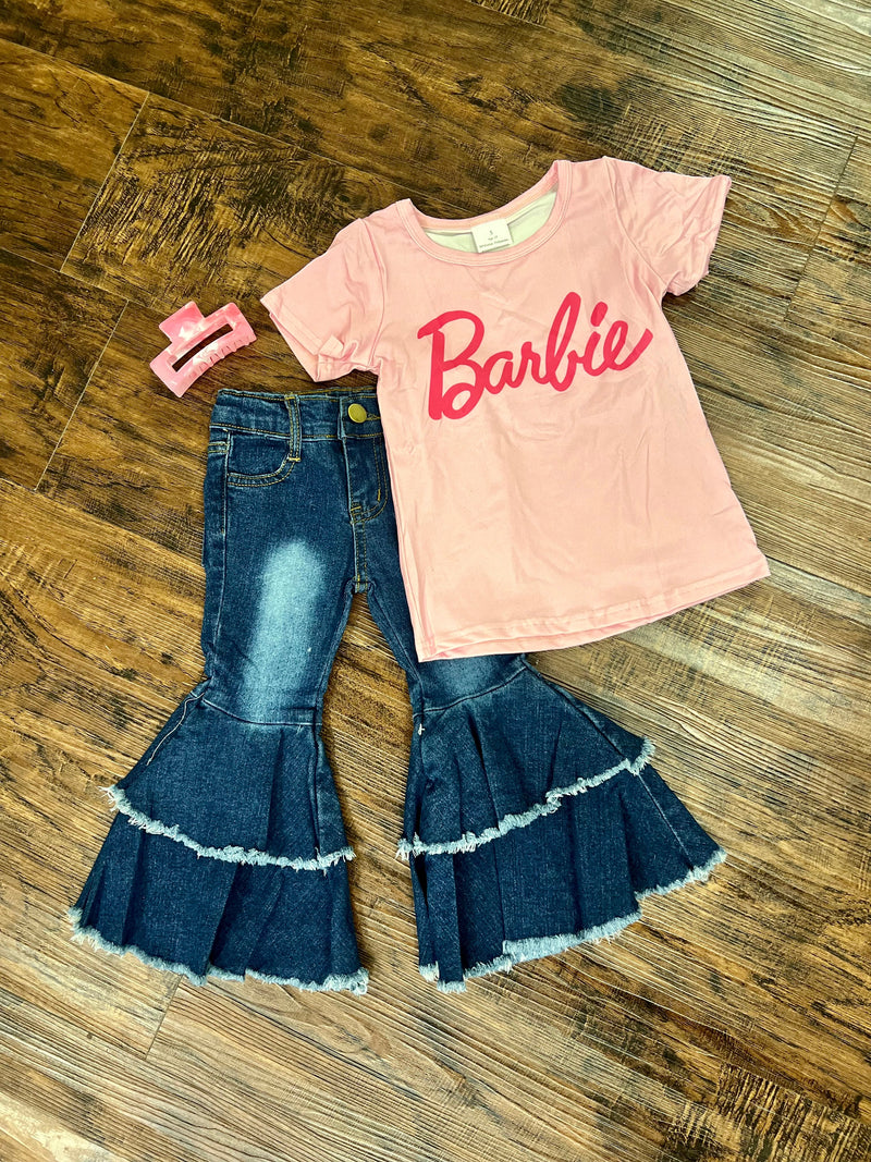 Show off some stylish Barbie love in this kids Mini Barbie Tee - a super-soft, pink number with hot pink graphic lettering to let everyone know who's your favorite! Get ready to make a statement (and match your mini-me) with this 95% Polyester, 5% Spandex tee!