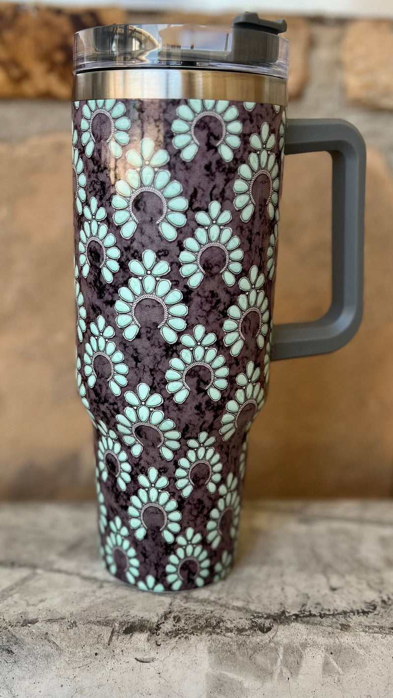 Set your thirsting Herd apart with these unique Turquoise Rodeo Queen 40 oz Tumblers. Choose from Purple/Turquoise Squash Blossom, Turquoise Concho, and Leopard/Concho designs - which will stay ‘cowboy cool’ no matter the temperature! Saddle up, grab a drink and take a ride with the best tumblers in town! Yeehaw!