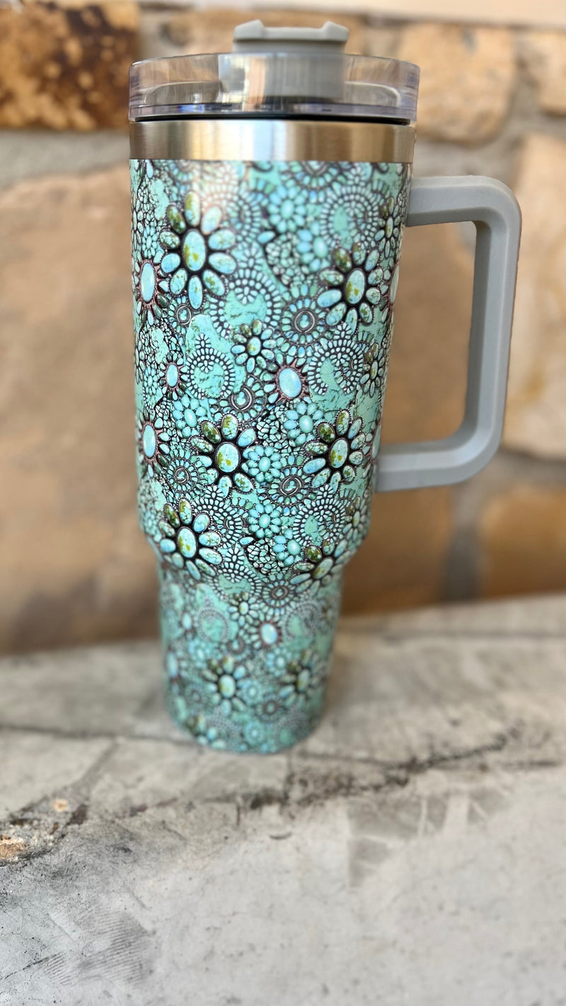 Set your thirsting Herd apart with these unique Turquoise Rodeo Queen 40 oz Tumblers. Choose from Purple/Turquoise Squash Blossom, Turquoise Concho, and Leopard/Concho designs - which will stay ‘cowboy cool’ no matter the temperature! Saddle up, grab a drink and take a ride with the best tumblers in town! Yeehaw!