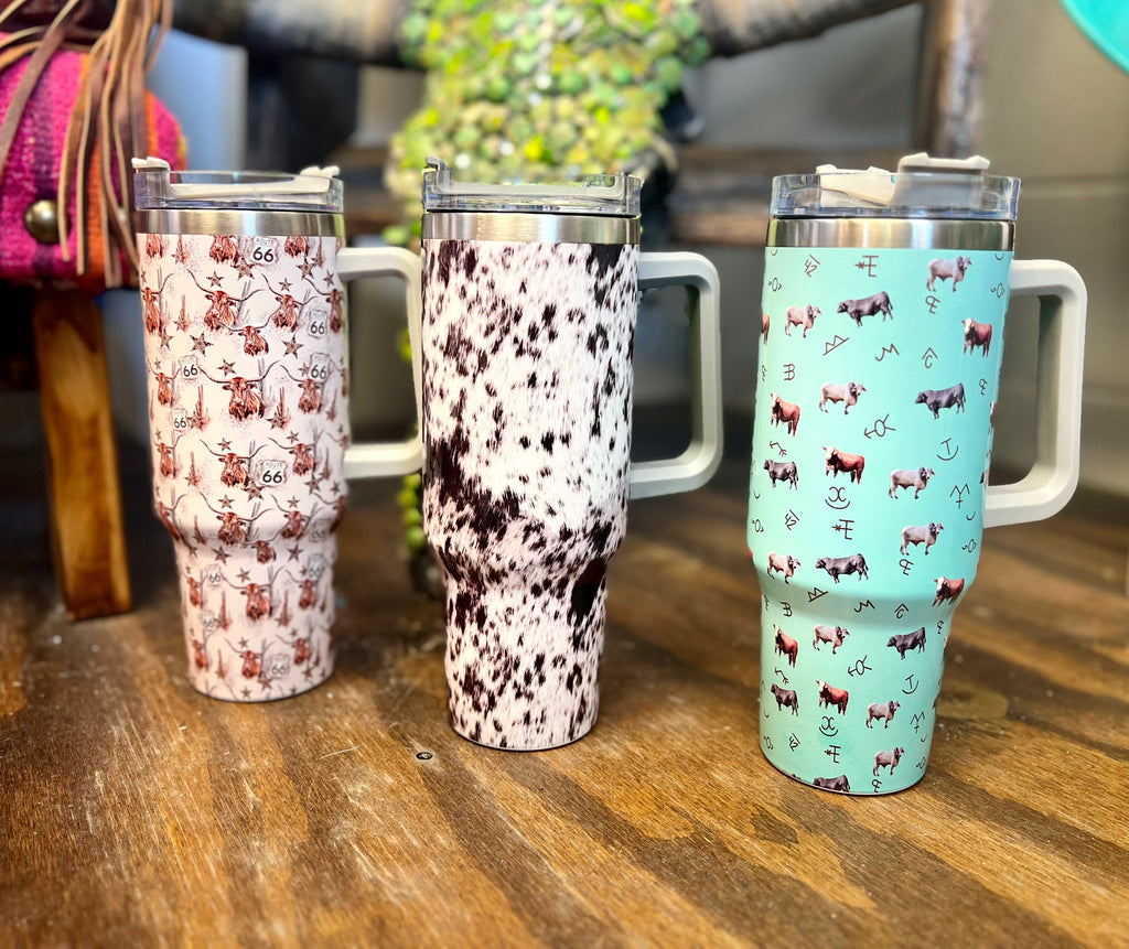 Set your thirst apart with these unique Big Bull 40 oz Tumblers. Choose from Turquoise Brand Bulls, Route 66 Longhorn, or Cow Print designs - which will stay ‘cowboy cool’ no matter the temperature! Saddle up, grab a drink and take a ride with the best tumblers in town! Yeehaw!