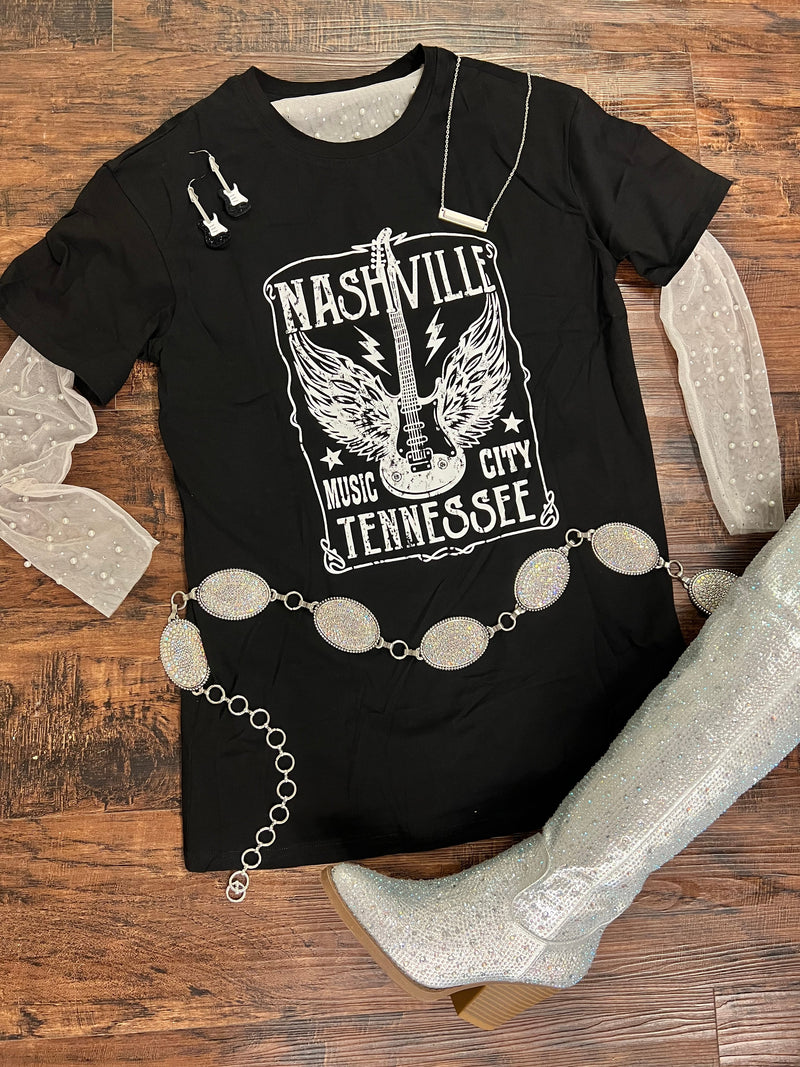 Show off your city pride and your love for music with this Nashville Music City T-Shirt Dress. Featuring an oversized fit, short sleeves, and a bold black and white guitar slogan with letter graphic print, it's an easy way to rock the cityscape look! Strum your fashion chords in style! 🎸