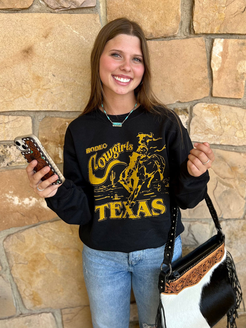 Lookin' to let your inner cowgirl shine? This Texas Cowgirls Sweatshirt is just the thing! Featuring a unique rodeo cowgirls Texas graphic, this 50% Cotton 50% Polyester long sleeve, crew neck is ready for some real rodeo fun. Yee-haw!   