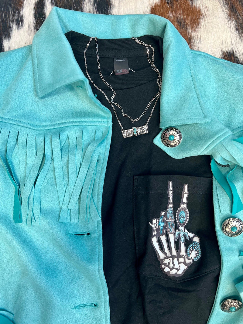 Rock on with this Western Decorated Skeleton Tee! Featuring a soft mineral-washed fabric and turquoise jewelry on the skeleton hand, this tee will have you looking spooky-cool. Not to mention the added bonus of looking fly (without a broom) So, grab this tee and get ready to party like a rockstar!  100% Cotton 
