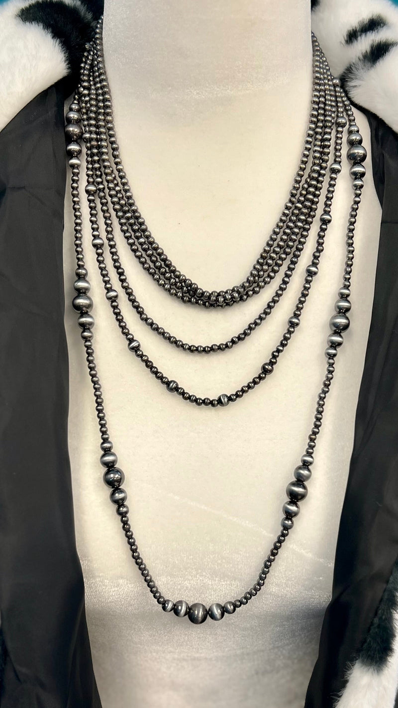 This At My Best Necklace will brighten up your neck with its stylish western Navajo Pearl design! From 16" to 24", there'll be plenty of length to make sure everyone's asking where you got it! Not to mention the 3" extender so you can rock it at your best!