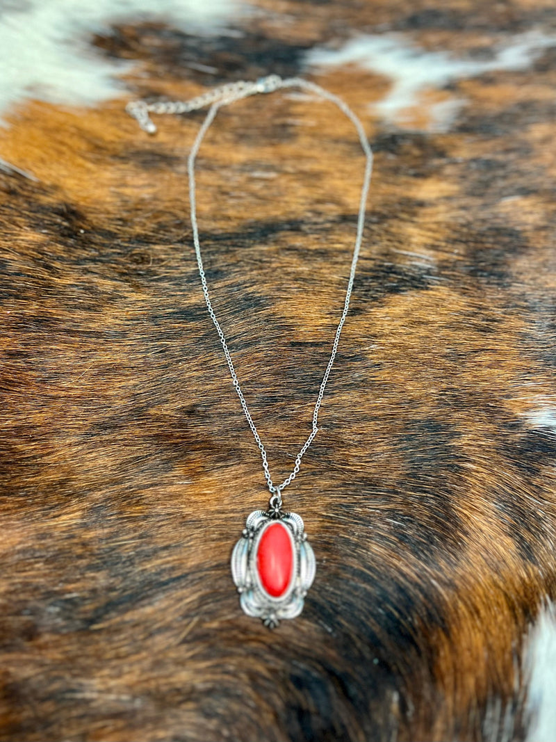 Show off your inner cowgirl with this western-inspired Her Heart Necklace! Its red stone pendant is set on a 20" silver chain with a 3" adjustable lobster extension. Plus, it's perfectly safe for sensitive skin since it's nickle free!