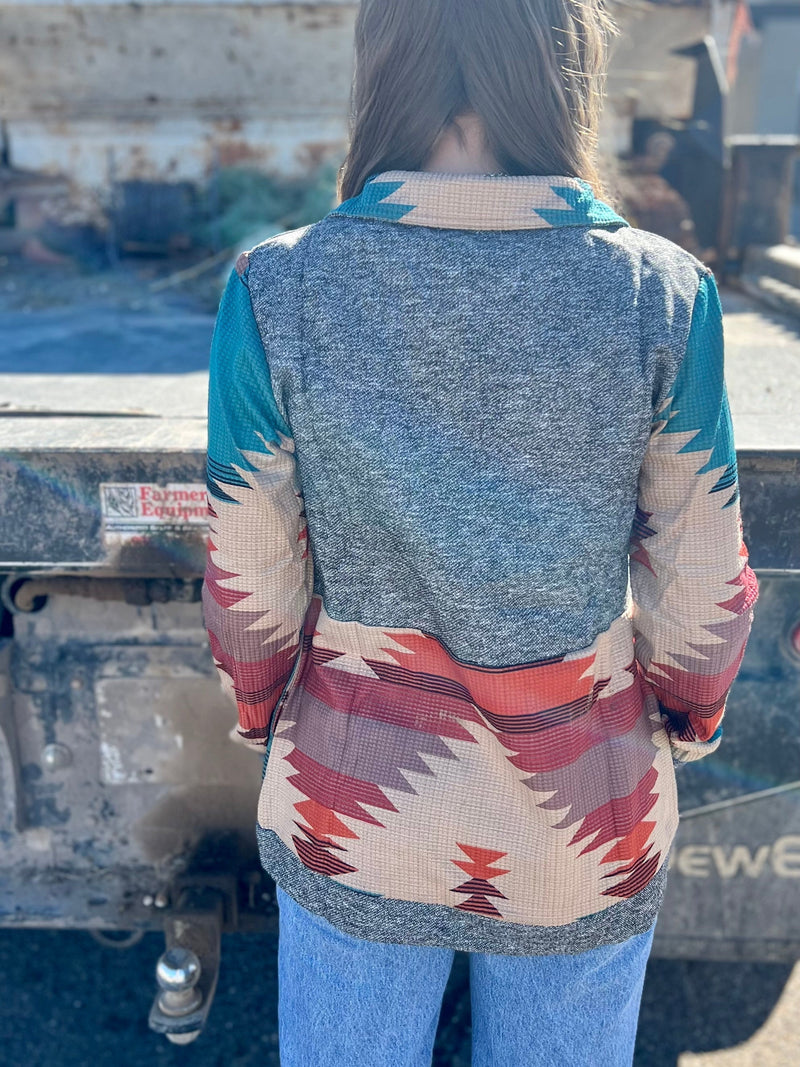 Look stylish and stay cozy in the Country Girl Jacket! This zip-up features waffle aztec sleeves, 90% polyester and 10% spandex, and comes in a variety of colorful hues. Get your perfect country chic look today!