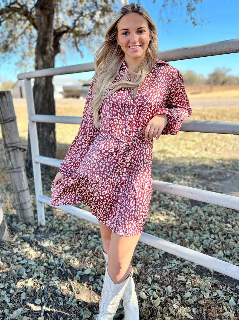 Red and white leopard print dress. Tie waist knee length dress. Button up collared dress. Women's western wear. Women's western boutique. Online boutique. Women's trending fashion. Small business. 