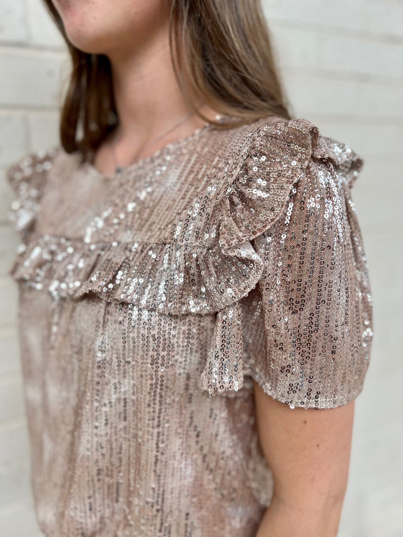 Sequin ruffle dress top. Gold sparkly dress top. Pink sparkly dress top. Glitter gold ruffle top. Pink glitter ruffle top. Women's western boutique. Online boutique. Women's western wear. Women's trending fashion. 