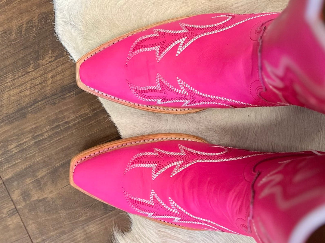 Ferrini Boot Company I Gussied Up Online. pink. cowgirl boots. Western cowgirl boots. hot pink. genuine leather. v toe. knee high. boots. sassy. western boot stitching. Small business. Western Women's Boutique. Ships fast from Texas. 