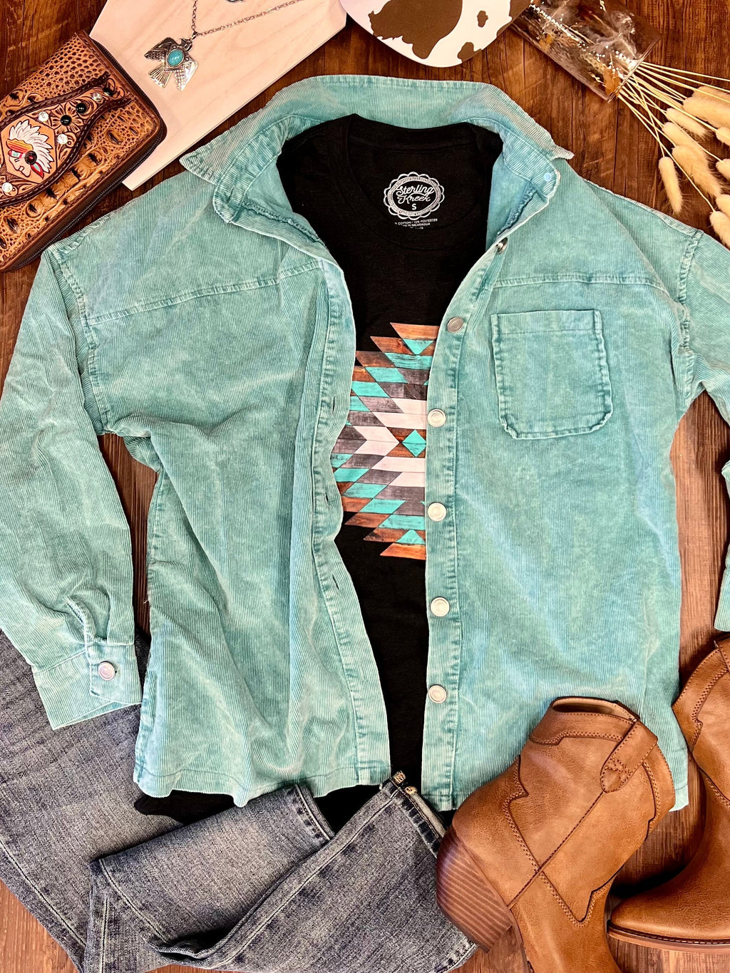 This Teal Acid Wash Corduroy Shacket is perfect for days when you just can't decide! It's the perfect mix of oversized style with a hi-low hem and long sleeve cut, making it oh-so-versatile. The acid-washed teal hue adds a side of chill, while front button closure keeps it fresh and flirty. Throw it on and go!  100% Polyester