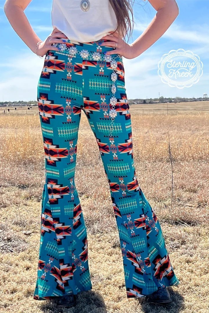 Be a style trailblazer and show off your chic style with the APPALACIAN BLUES BELLS! Featuring a unique blue aztec printed pattern, these bells are sure to make you the trendiest one around. Add this set of bells to your accessory collection and stand out from the crowd!   92% POLYESTER 8% SPANDEX