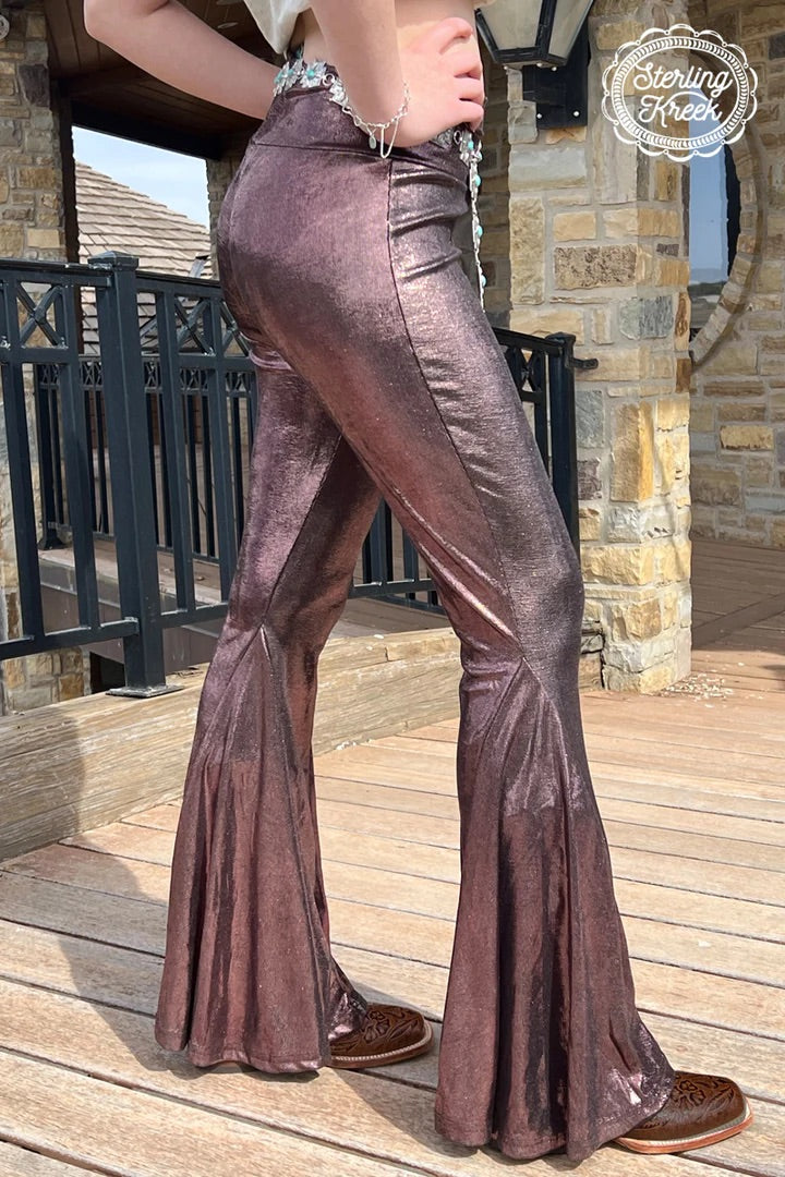 Show off your style with these PLUS TIME TO SHINE BELLS COPPER! These eye-catching copper-colored metallic bell bottoms will get you noticed from head to toe and keep the compliments coming in! Strike a pose and bring out your inner trendsetter — it's time for you to shine!  olivia is wearing an XS  92% POLYESTER 8% SPANDEX