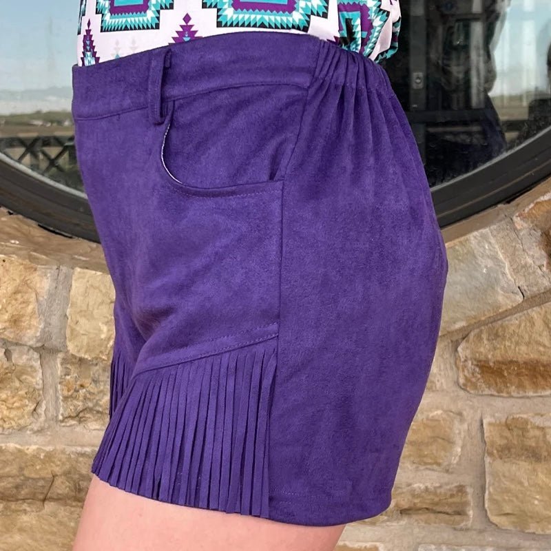 Shake up your style with the Nashville Babe Shorts! These purple suede fringed shorts will make you the envy of Music City! So strut your stuff and show off your one-of-a-kind style! Yee-haw!     92% POLYESTER 8% SPANDEX