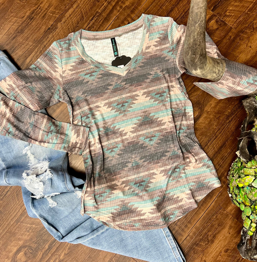 Sterling Kreek Brand. Sterling Kreek Top. Burned out tops. Burned out aztec top. Long sleeve top. Lightweight top. Western style. Western tops. Women's western tops. Women's western style. Western fashion trends. Western boutique. Turquoise aztec top. Small business. Woman owned. Fast shipping from Texas.