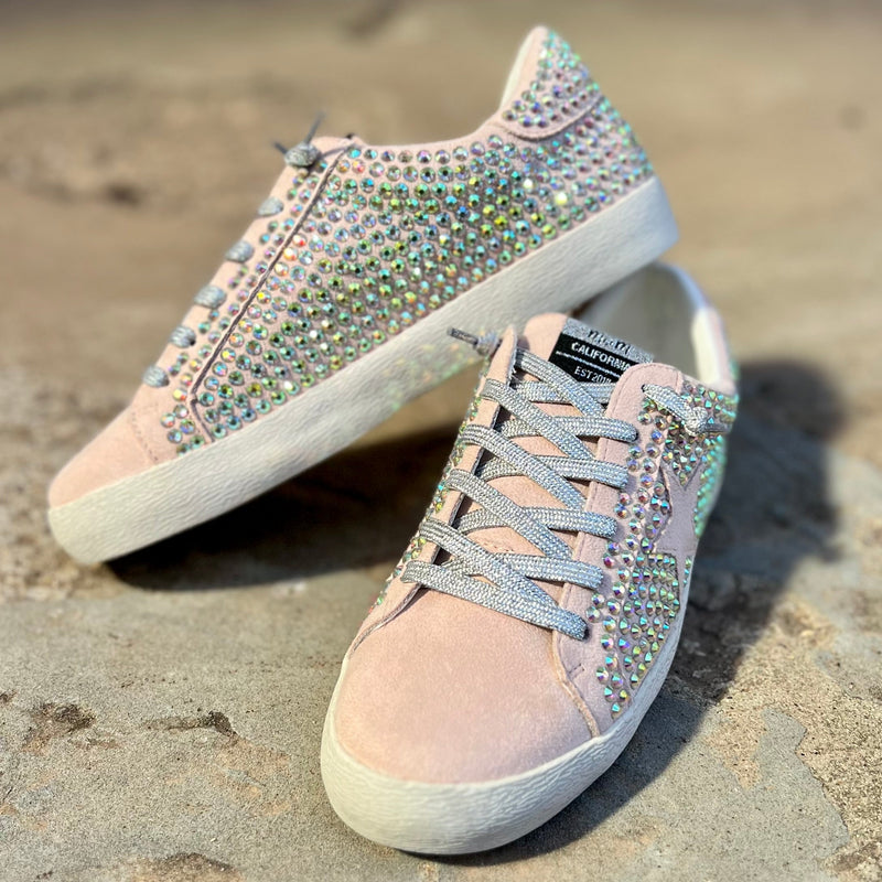 Our Highlight of My Outfit sneakers take casual to the next level with a pink star on a silver lace up and a multi-color rhinestone detail. The combination of these features ensures an eye-catching look, while the soft pink suede provides all day comfort.