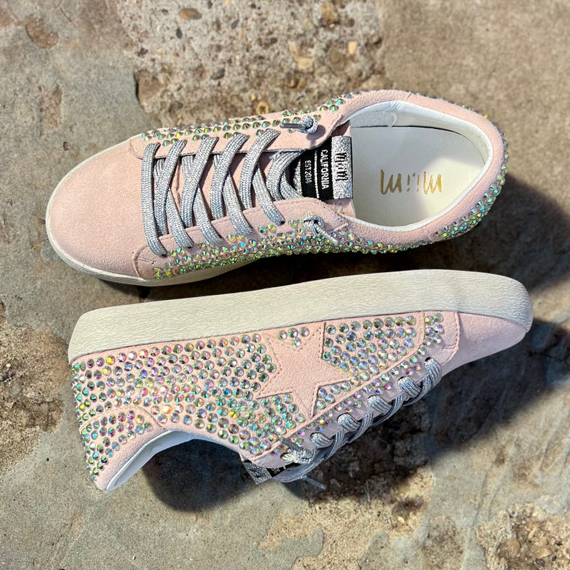 Our Highlight of My Outfit sneakers take casual to the next level with a pink star on a silver lace up and a multi-color rhinestone detail. The combination of these features ensures an eye-catching look, while the soft pink suede provides all day comfort.