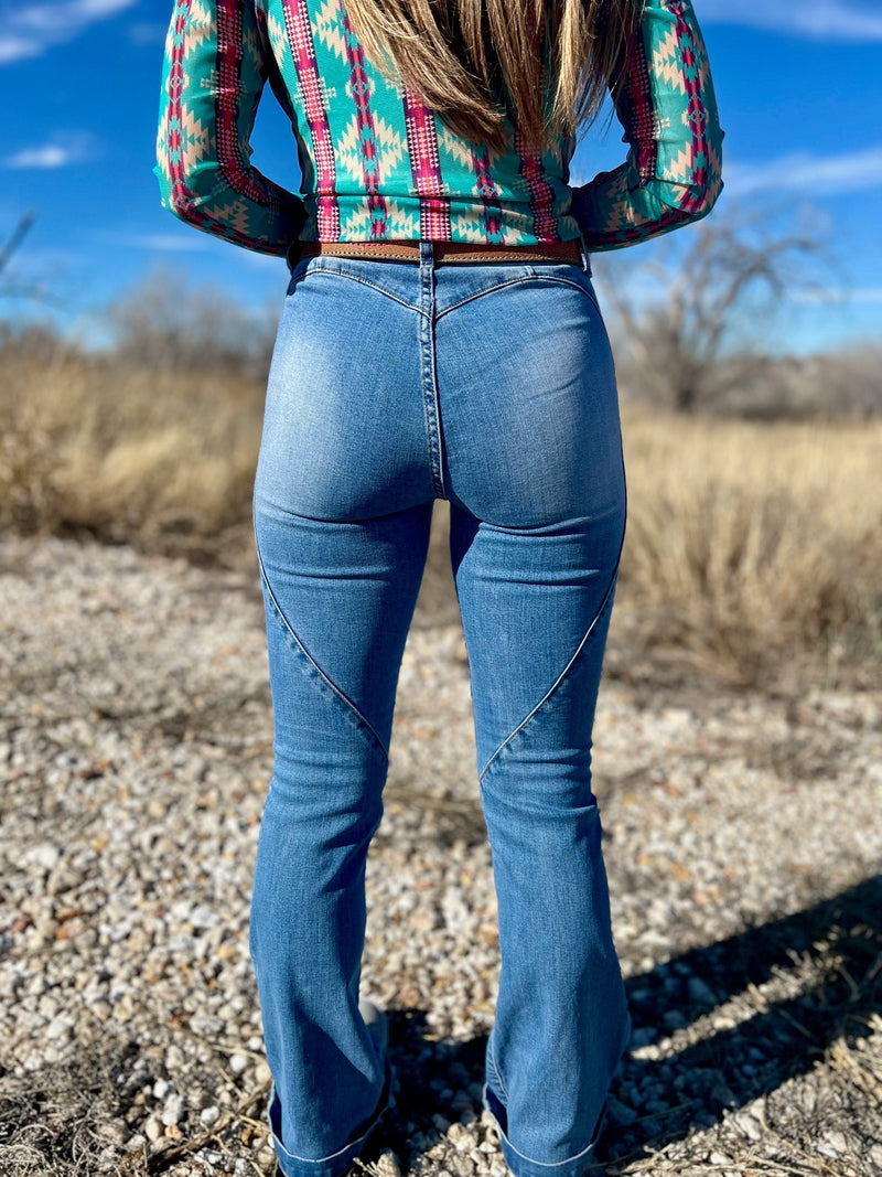 Vintage style denim. Boot cut jeans. Jeans with no back pockets. Western denim. Western wear. Women's jeans. Fashion trends. Boutique. Small business. Woman owned. 