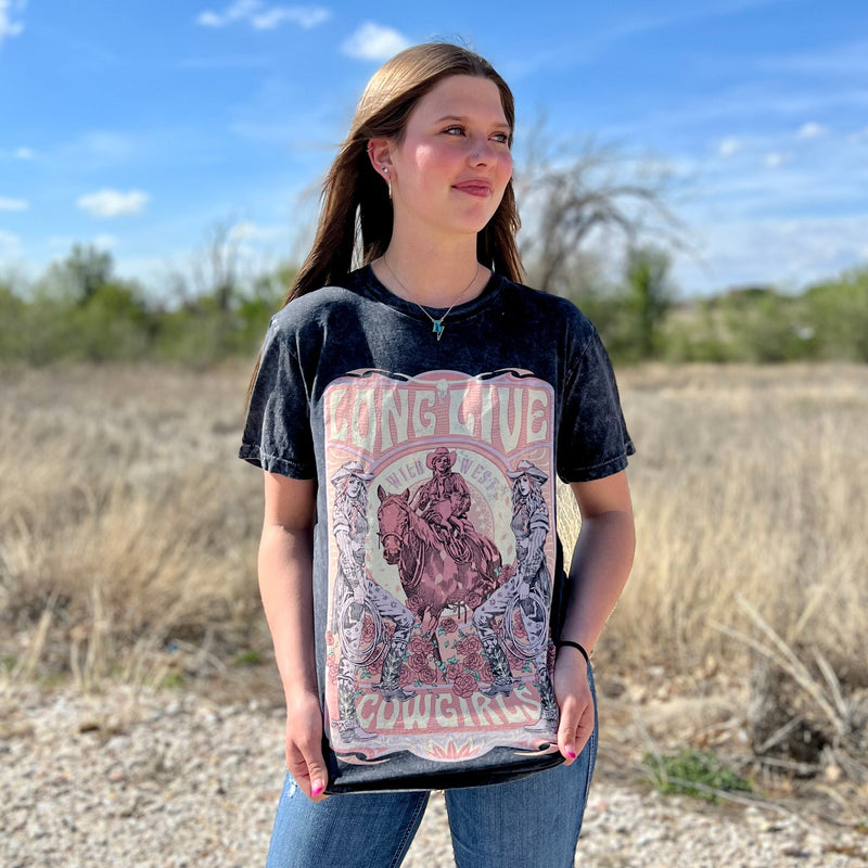 Give your wardrobe a wild west touch with this fun PLUS size Hand Drawn Cowgirl's Graphic Tee! Crafted with a cool black mineral washed base, this 100% cotton tee features a classic short sleeve cut, crew neckline, and an open neckline to keep you cool this summer. Yee-haw!