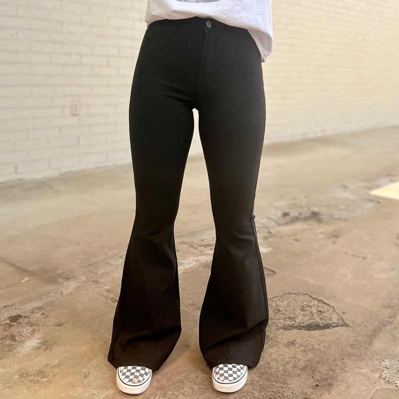 Looking for a way to show off those gorgeous legs? Look no further. Where'd Ya Get Them Flares has you covered! These black, super stretch flares provide a perfect fit and will show off your to-die-for physique. Plus, with their fashionable flair, you can sashay with sass! Flaunt it, darling!