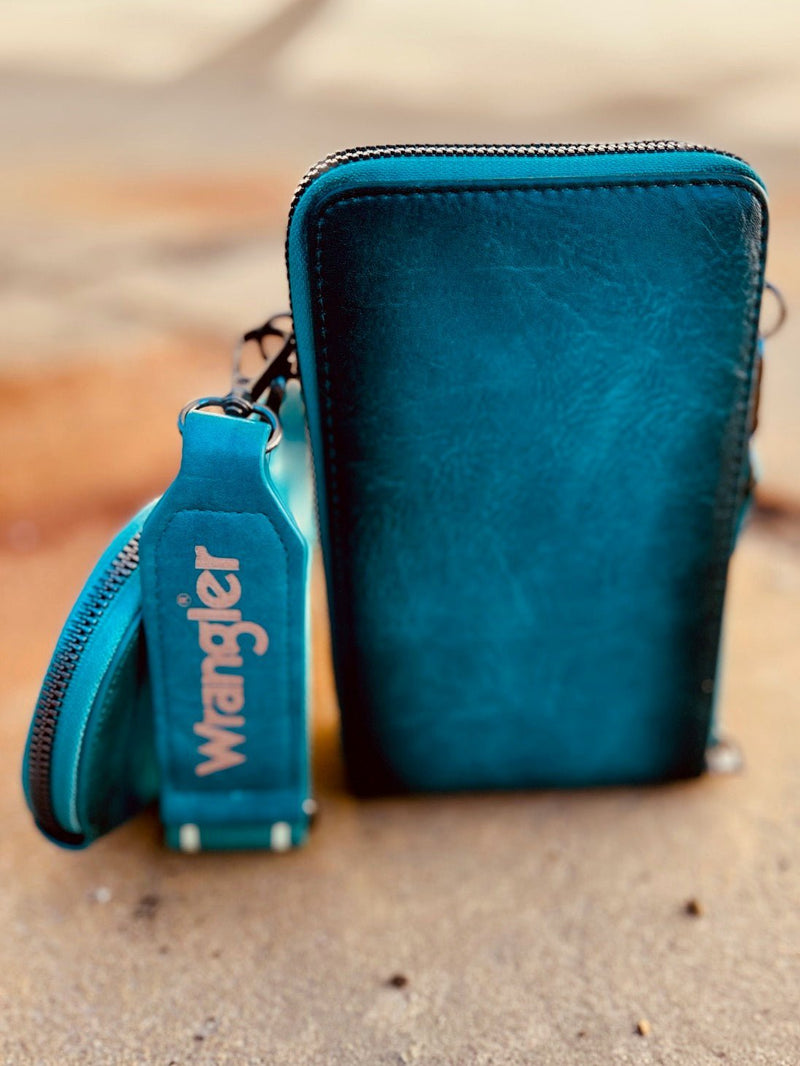 turquoise, leather, sling bag, crossbody. Small Business. Get Gussied Up. Woman Owned Boutique. 