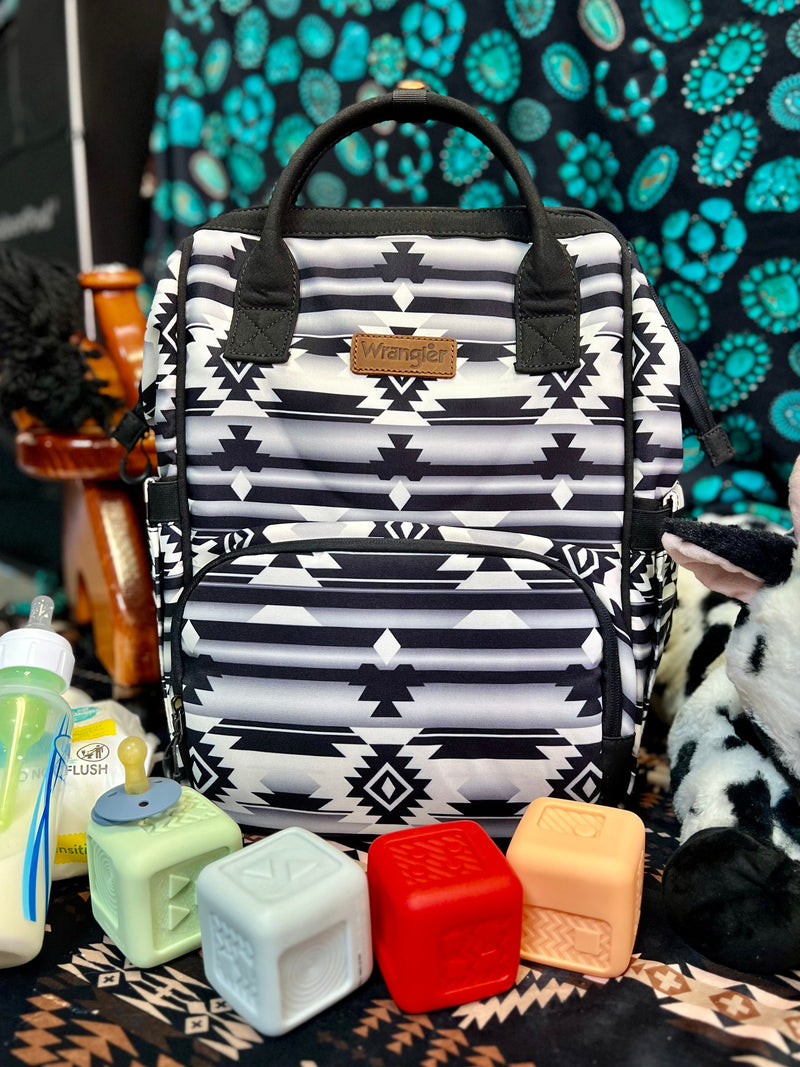 Diaper Bag. Western bag. Western diaper bag. Wrangler diaper bag. Aztec diaper bag. backpack diaper bag. Black Aztec bag. Grey aztec diaper bag. Western trend. New parents bag. The best diaper bags. Western boutique. Boutique. Small business. Woman Owned. Gussieduponline.com