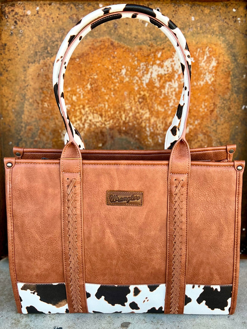 large handbag, brown leather, cow print. Get Gussied Up. Small Business. Woman Owned Boutique. 