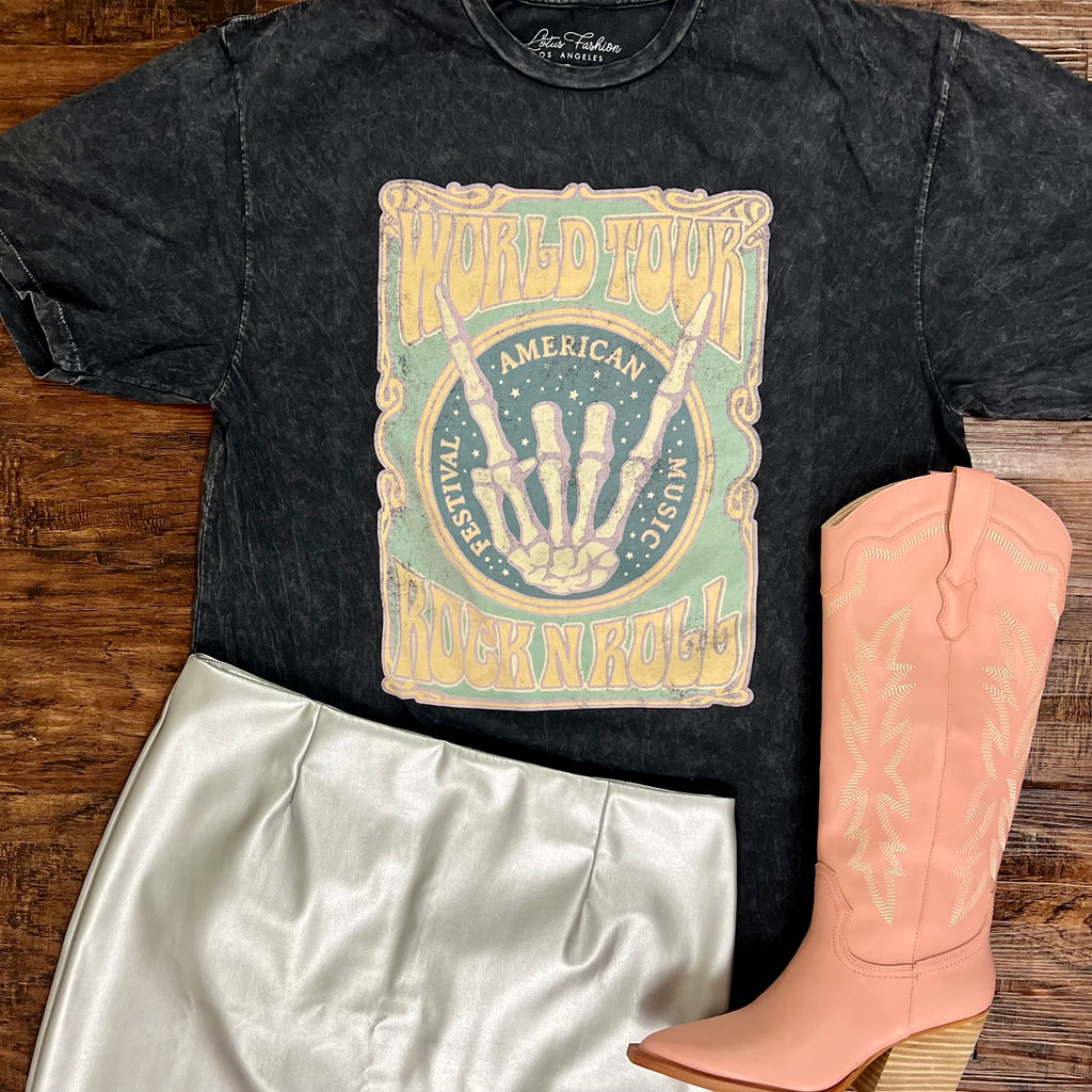 Are you ready to rock the world? Slip on this Vintage Black Mineral Washed, 100% cotton graphic tee and set off on an epic musical journey. From the open neckline to the signature graphic, this short sleeve, crew neck is an absolute must-have for any rock and roll fan! Live your best life in style!