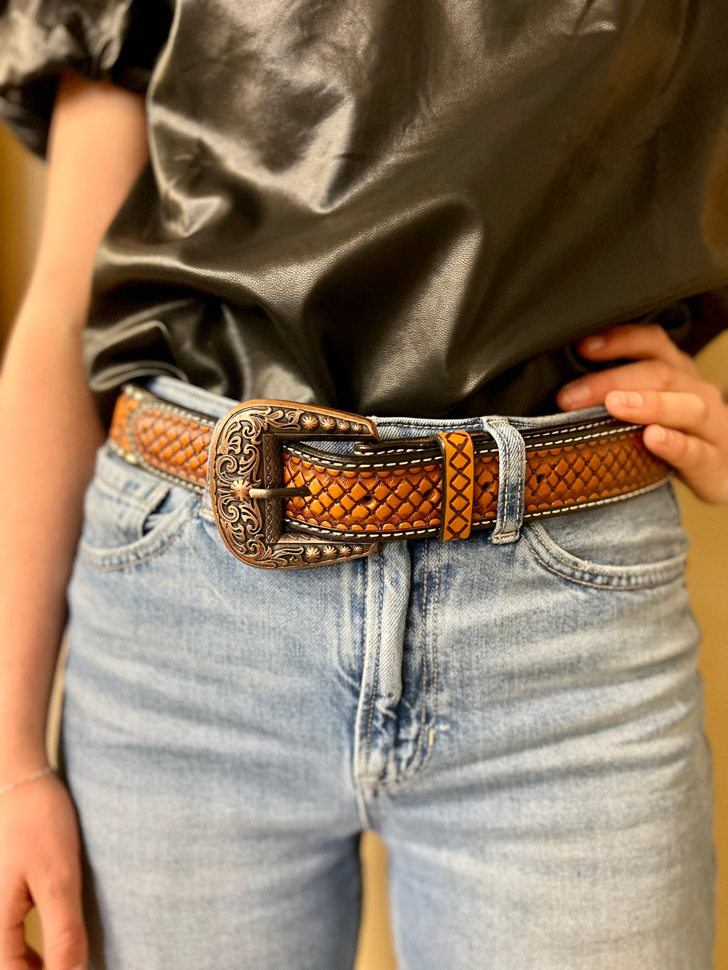 Brown leather belt. Tooled leather belt. Brown belt. Belt with copper buckle. Interchangeable buckle. Western Style Leather belt. Western Belt. Women's leather belt. Women's western accessories. Western boutique. Small business. Woman owned. 