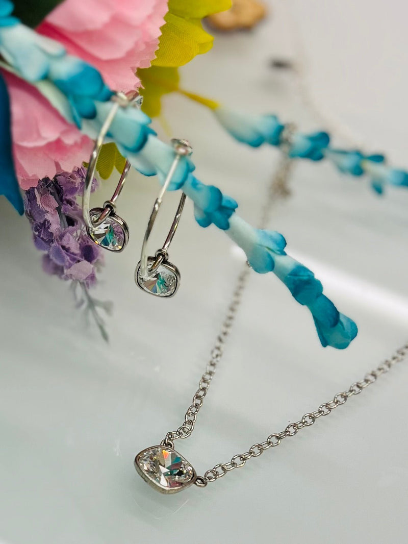 Crystal stone hoop earrings. Silver hoop earrings with stone. Sparkly hoop earrings. Women's fashion jewelry. Women's elegant jewelry. Women's western wear. Women's western boutique. Online boutique. Small business. 