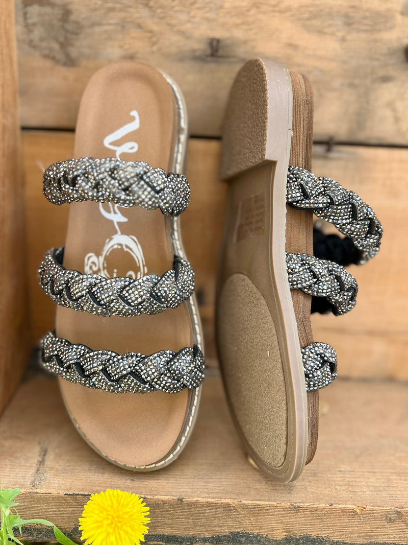 Black and silver. braided. strappy sandals. shiny. flats.  Womens Boutuique. Small Business. Womens western boutique.