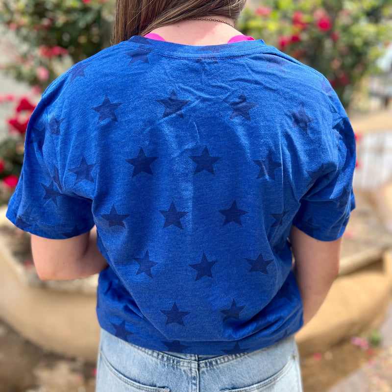 This PLUS Brightly Patriotic Tee is perfect for celebrating your love of the USA. It comes in bright blue with dark blue stars and features a bold and bright-colored multi-Serape print flag. The tee is made of 60% cotton and 40% polyester for durability and comfort