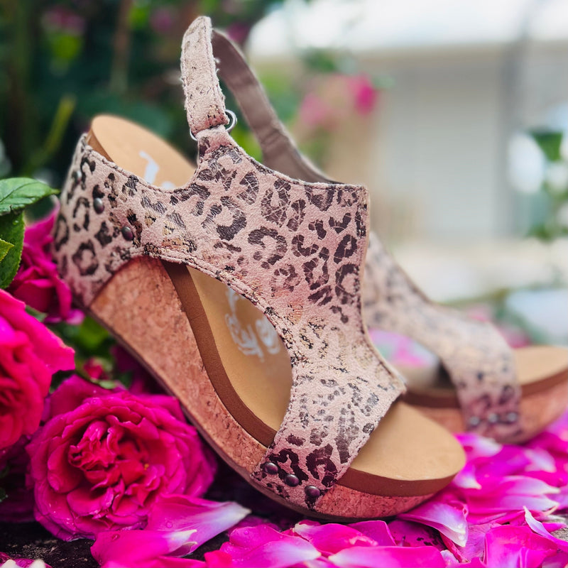 Step into summer with these Afternoon in the Wild Wedges – the perfect balance of timeless style and all-day comfort! You'll strut the streets in leopard print with the shimmer of color in the design – who said canvas shoes had to be boring?! Slide these wedges on and get ready to turn heads, one stylish step at a time. The Velcro back strap keeps your foot in place all day.  True to size   3"Wedge Heel
