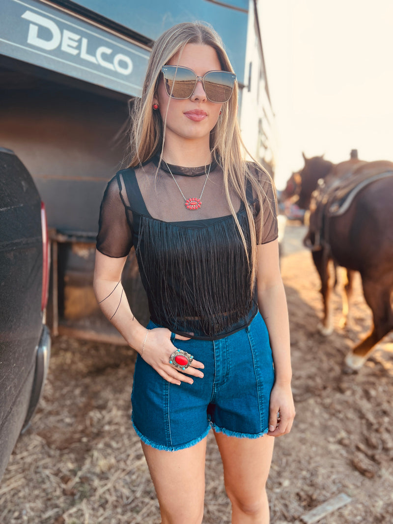 Black sheer top. Black mesh top. Black sheer top with fringe. Black mesh top with fringe. Sheer fringe top. Top with fringe. Western top. Western vibes top. Western style top. Going out outfit. Concert outfit. Rodeo outfit. Trendy style. Trending western style. Western outfit. Cowgirl outfit. Small business.  