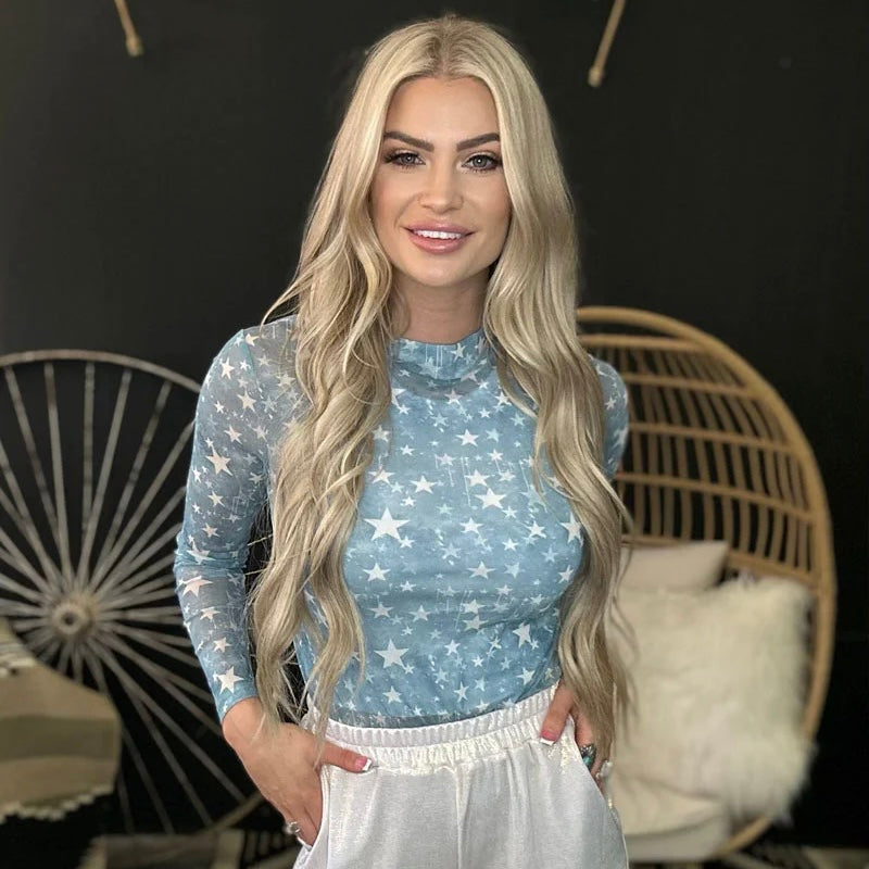Explore the night sky while wearing the PLUS Keeper Of The Stars Top! This beautiful blue mesh long sleeve top is covered in white stars, making it perfect for star-gazers, late-night walkers, and fashion-forward dreamers. Step out of this world in style!  96% POLYESTER 4% SPANDEX