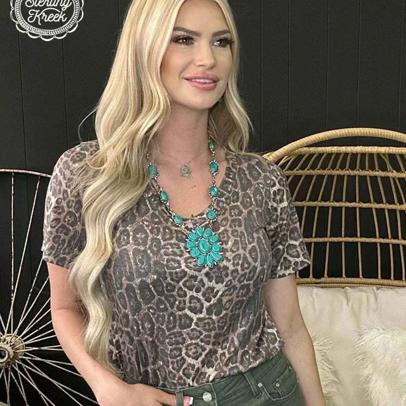 Make sure you're cheetah-level cute in this PLUS Sweet Caroline Top! This faded v-neck style makes a statement, but is still subtle enough for everyday wear. Go wild for this high-quality style!